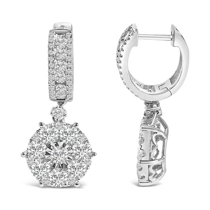 Front and side views of a pair of white metal drop earrings set with multiple white round gemstones in prong, miracle, and channel settings.