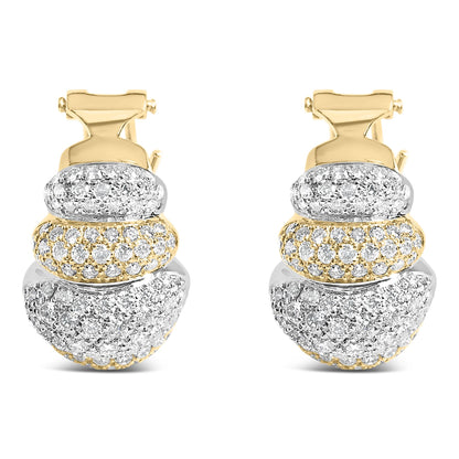 Close-up front view of a pair of earrings featuring alternating sections of yellow and white metal, adorned with numerous small white gemstones in a pave setting.