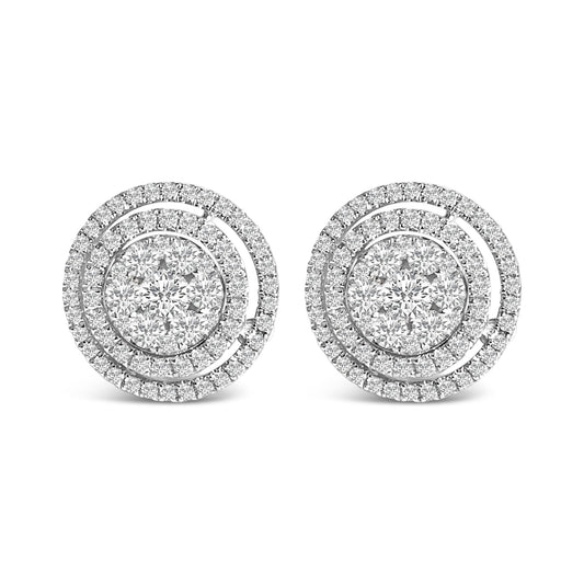 Pair of white circular earrings with clusters of round white gemstones at the center, surrounded by two concentric rings of smaller round white gemstones, shown in a front-facing view on a white background.