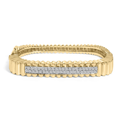 Yellow bracelet with rounded ridges and a horizontal bar set with small white gemstones in a pave setting, shown in a front-facing angle on a white background.