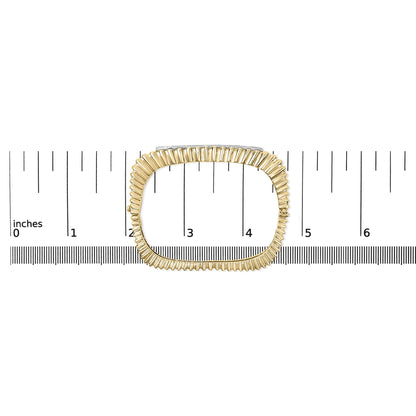 Top-down view of a yellow bracelet with a ridged design and a row of white round pave-set gemstones, shown on a scale.