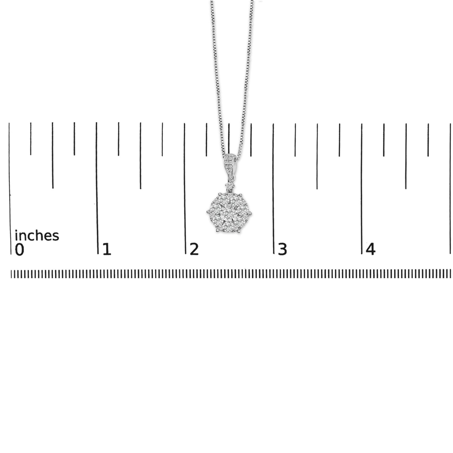 White necklace with a round cluster pendant featuring white gemstones in miracle, shared prong, and prong settings, shown on a scale from a front angle.