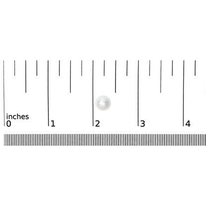Image showing a single white round gemstone earring on a ruler scale, photographed from above.