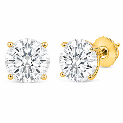 Front and side view of yellow metal stud earrings with round white gemstones in 4-prong settings, shown on a white background.
