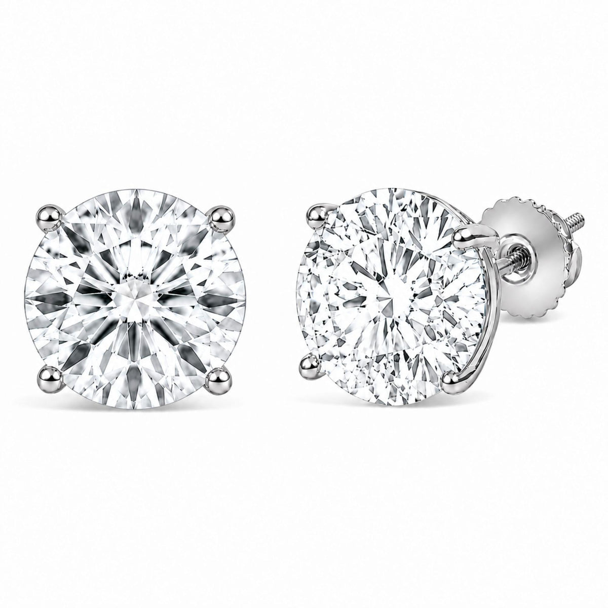 Close-up front and side angle of a pair of white metal stud earrings with round white gemstones set in 4-prong settings.