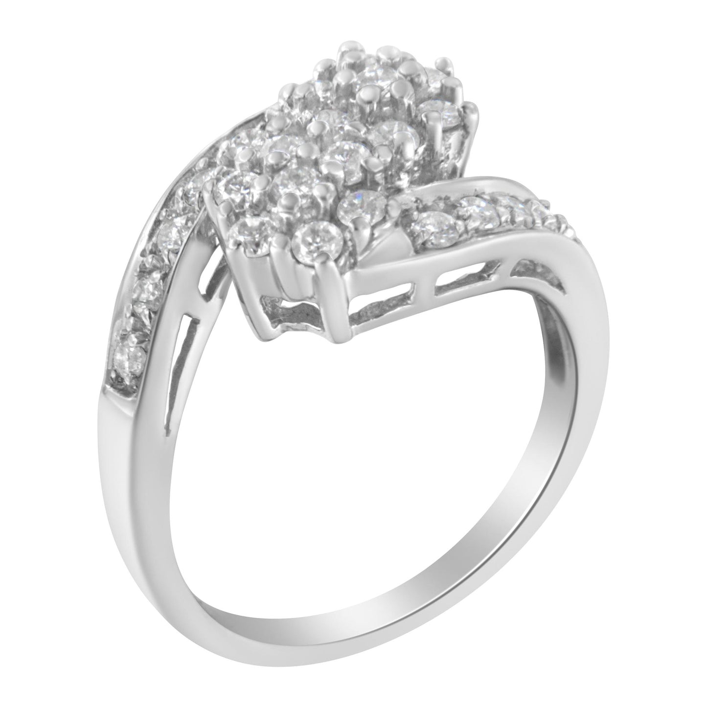 White metal ring with round white gemstones in prong settings, viewed from an angled top perspective.
