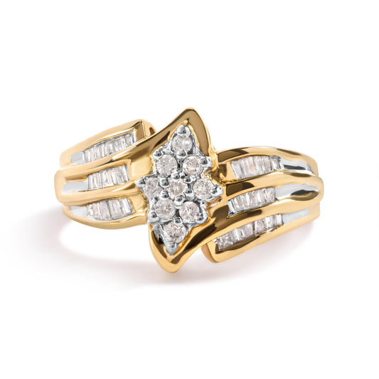 Yellow metal ring with a star-shaped cluster of prong-set round white gemstones at the center and channel-set baguette white gemstones along the split band, shown from a front angle.
