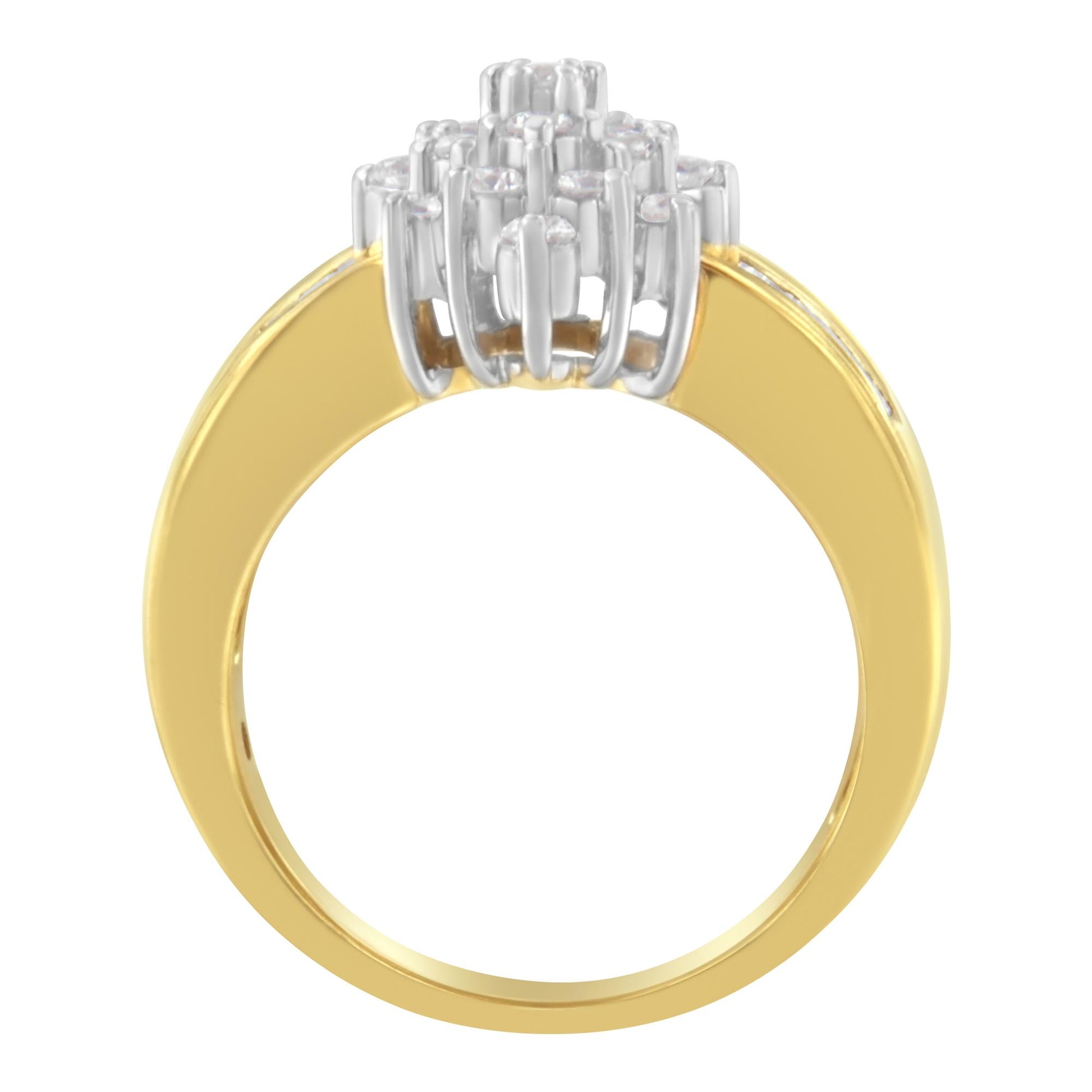 Front angled view of a yellow metal ring featuring a cluster of white round gemstones in prong settings and white baguette gemstones in channel settings on the top.