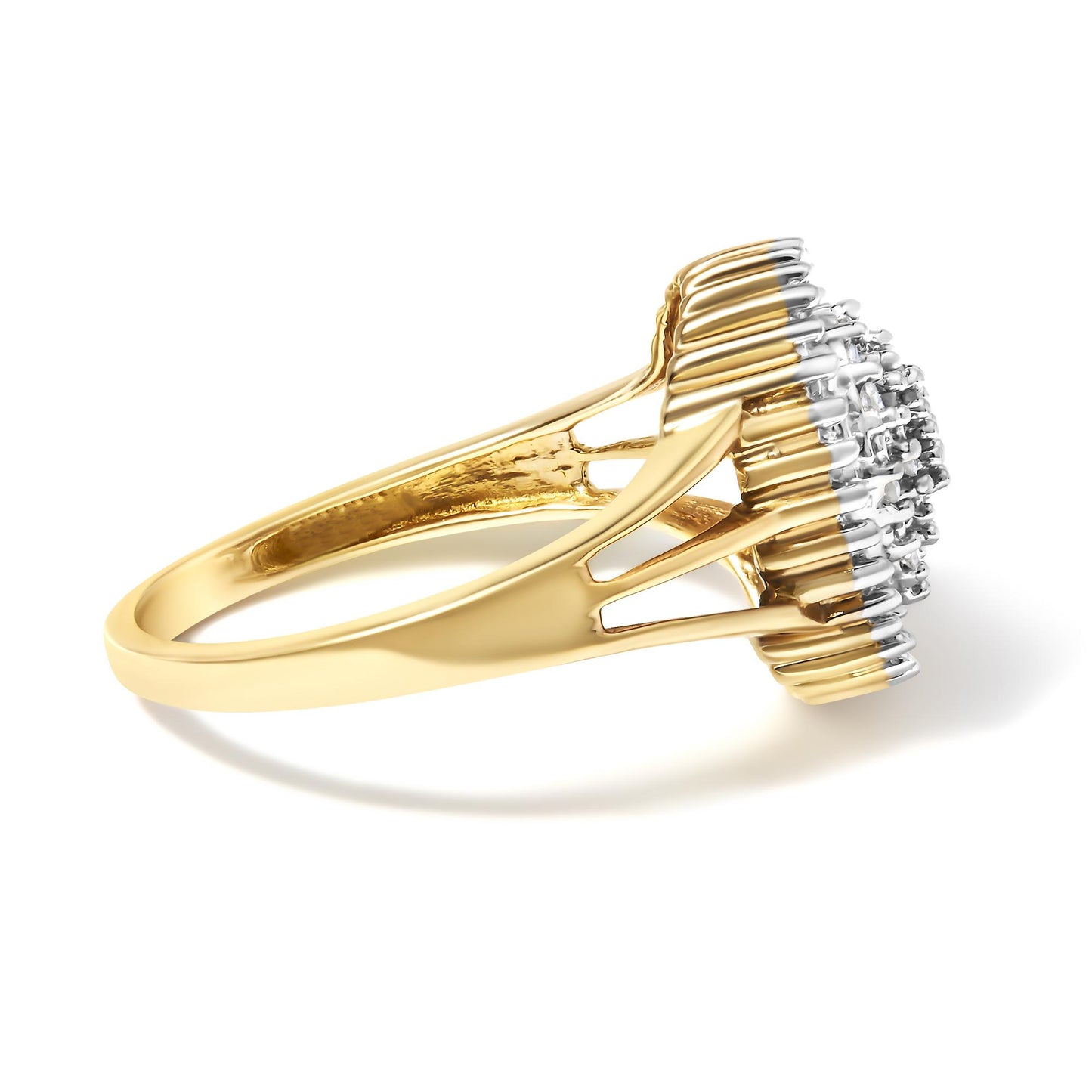 Side angle view of a yellow metal ring featuring round white gemstones in prong settings and baguette white gemstones in channel settings on the top.