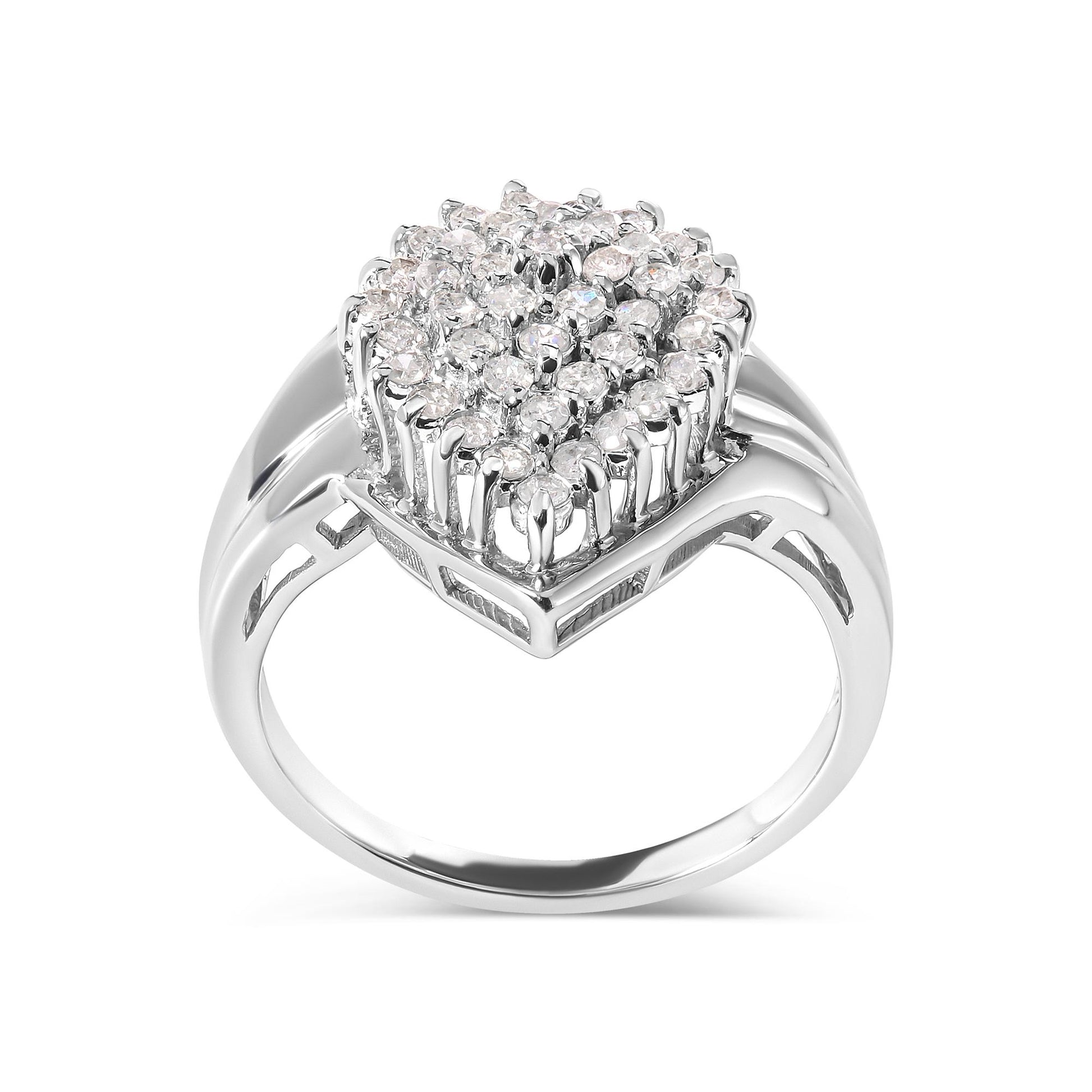Front angled view of a white metal ring featuring a cluster of round white gemstones in prong settings on top.
