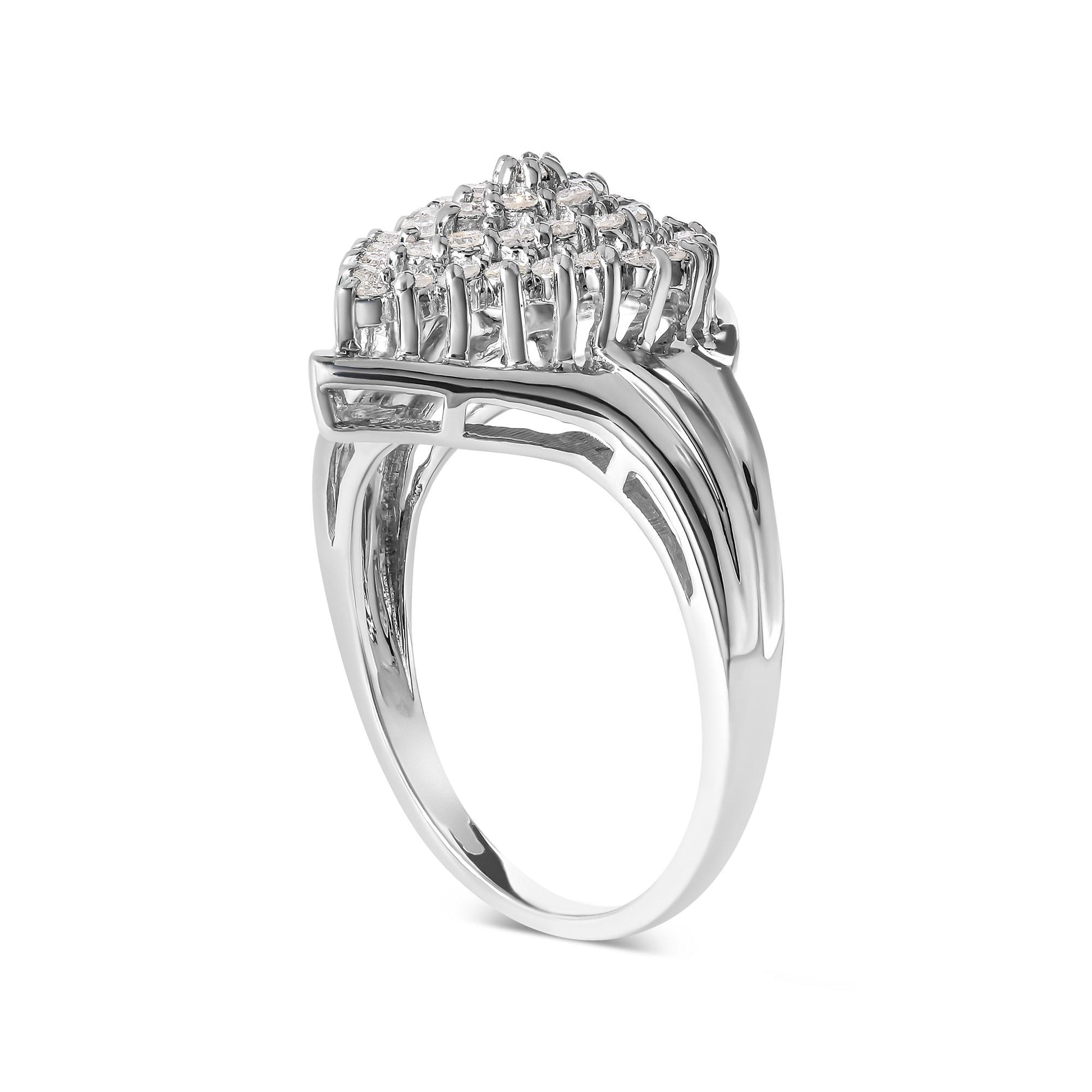 Side angle view of a white metal ring featuring multiple round white gemstones in prong settings.