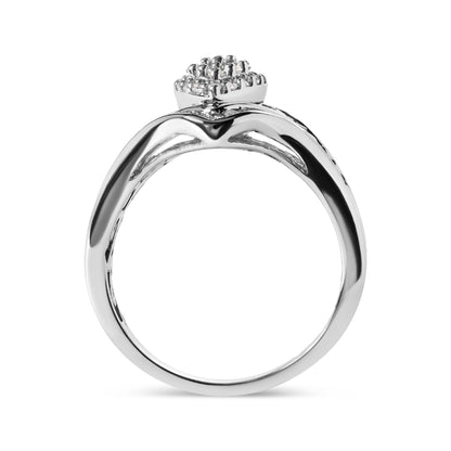 Side view of a white metal ring with a cluster of round white gemstones in prong settings and baguette white gemstones in channel settings.