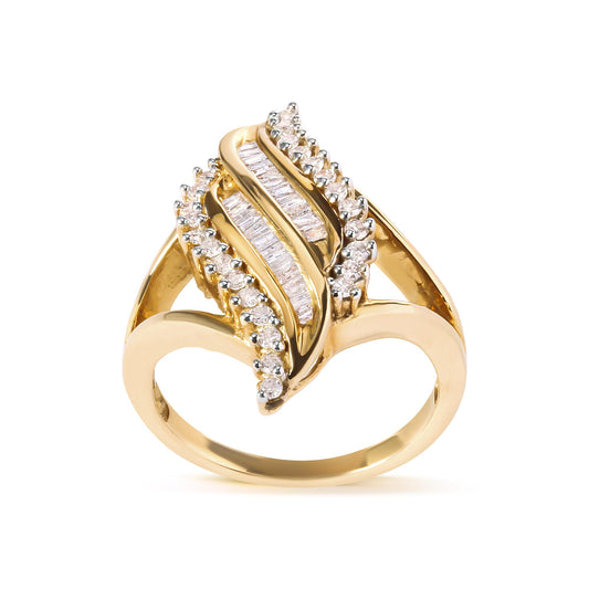 Front angle view of a yellow ring featuring curved rows of round white gemstones in prong settings and straight rows of baguette white gemstones in channel settings.
