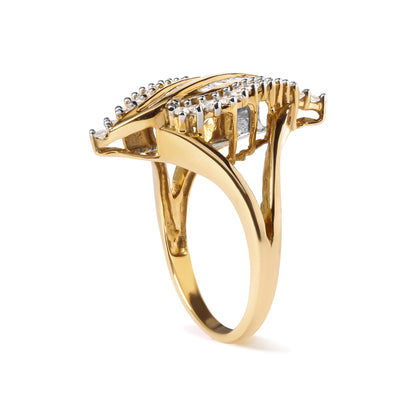 Side angle view of a yellow metal ring featuring white round gemstones in prong settings and white baguette gemstones in channel settings.