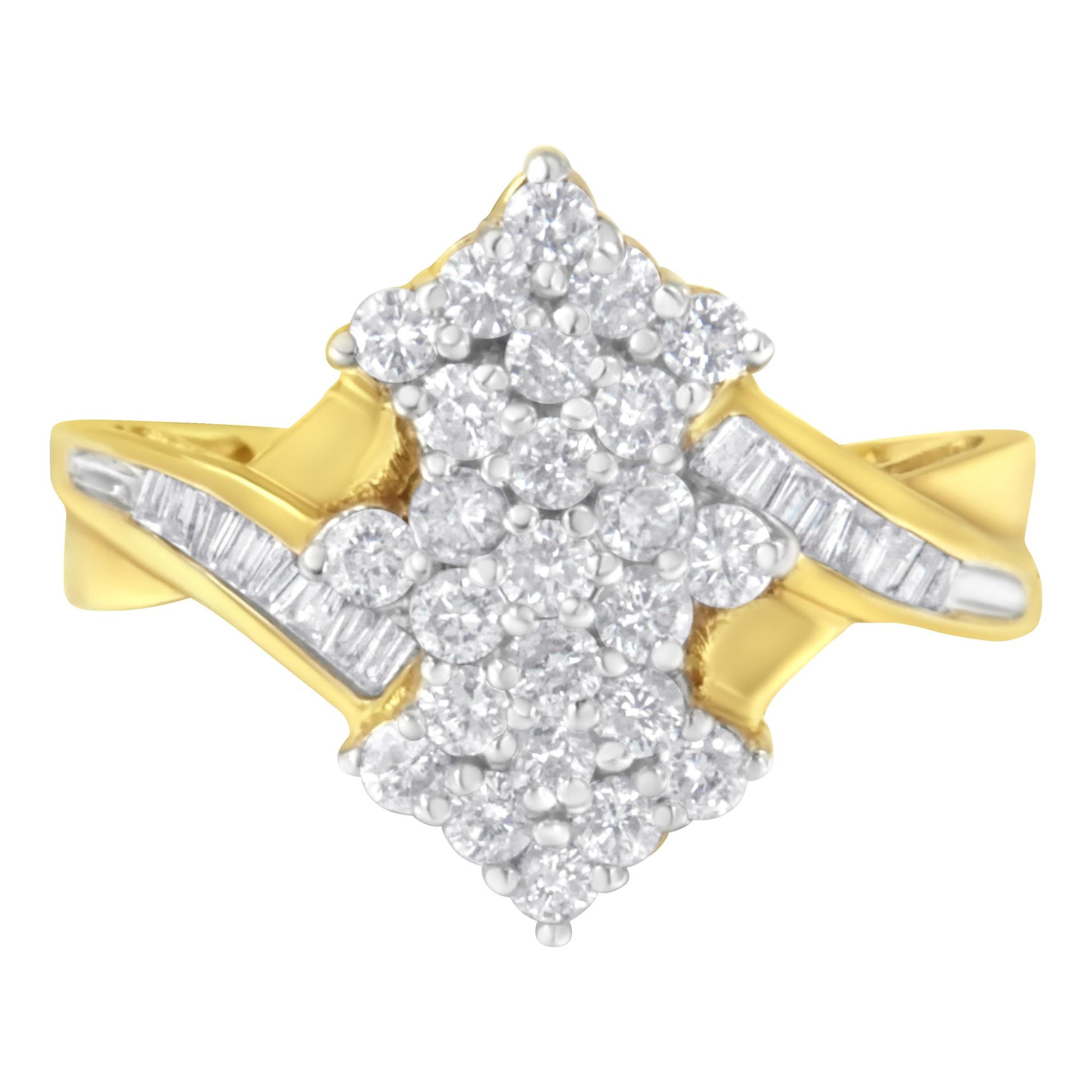 Front-facing view of a yellow metal ring with a cluster of round white gemstones in prong settings at the center, flanked by baguette white gemstones in channel settings on each side.