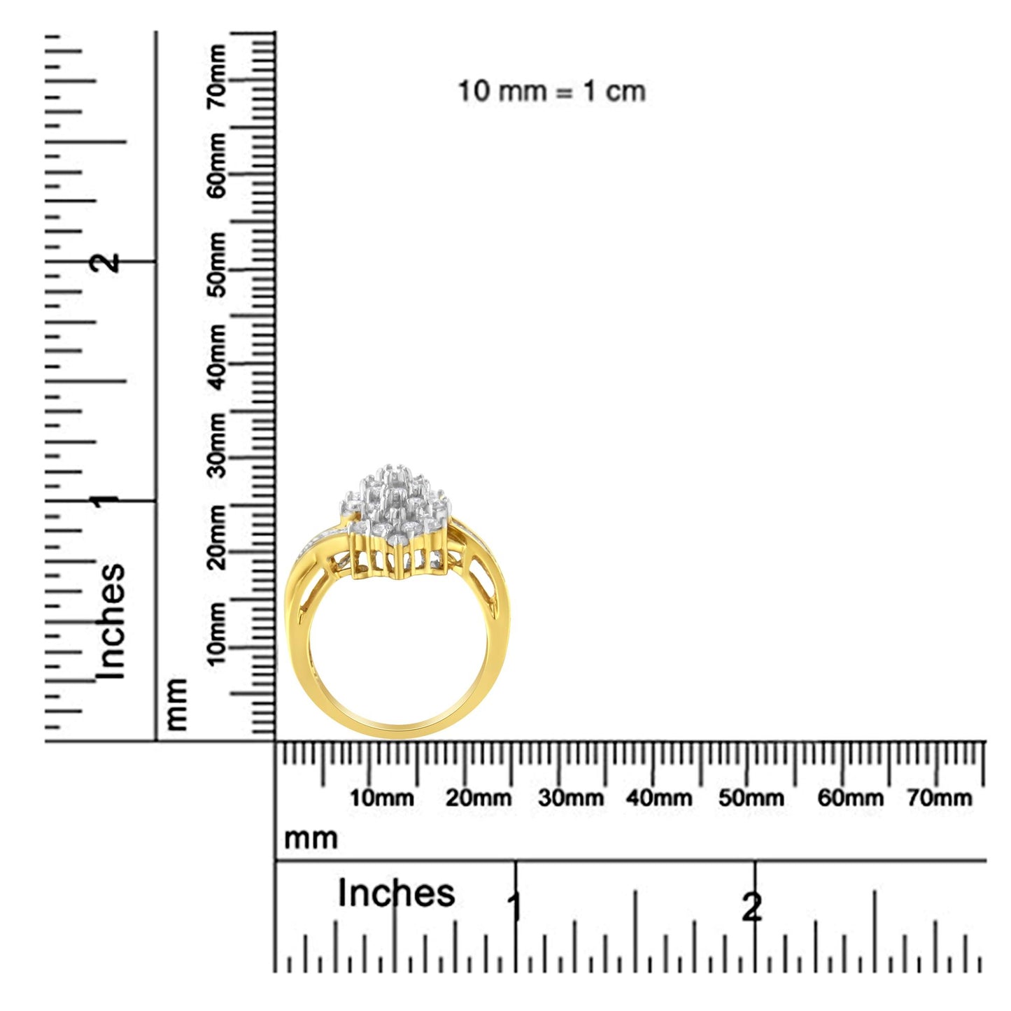 Yellow metal ring with cluster of prong set white round gemstones and channel set white baguette gemstones, side view, on ruler for size reference.