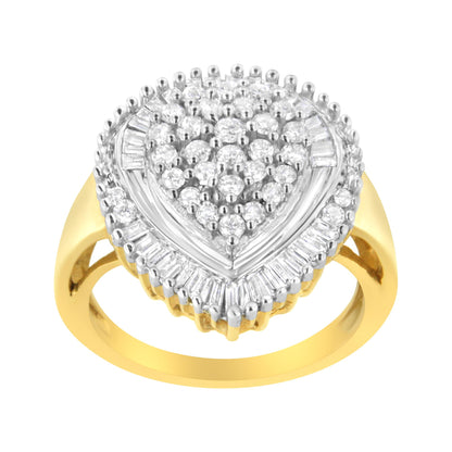 Top front angle view of a yellow ring featuring a heart-shaped cluster of round prong-set white gemstones surrounded by a border of baguette channel-set white gemstones.