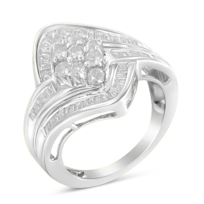 White metal ring with clusters of round white gemstones in prong settings and rows of baguette-shaped white gemstones in channel settings, shown from a front angled view.