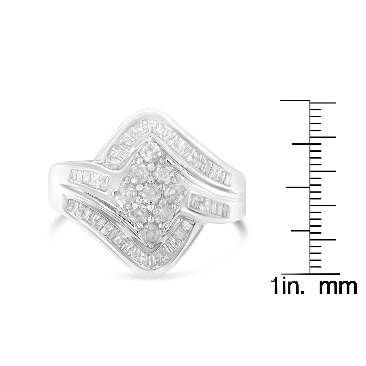 Front angle of a white ring with round prong-set white gemstones clustered in the center and baguette channel-set white gemstones outlining the front design, shown next to a ruler for size reference.