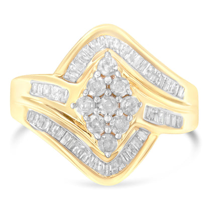 Yellow metal ring with round prong-set white gemstones clustered at the center, surrounded by channel-set baguette white gemstones in a geometric pattern, shown in a front-facing angle.