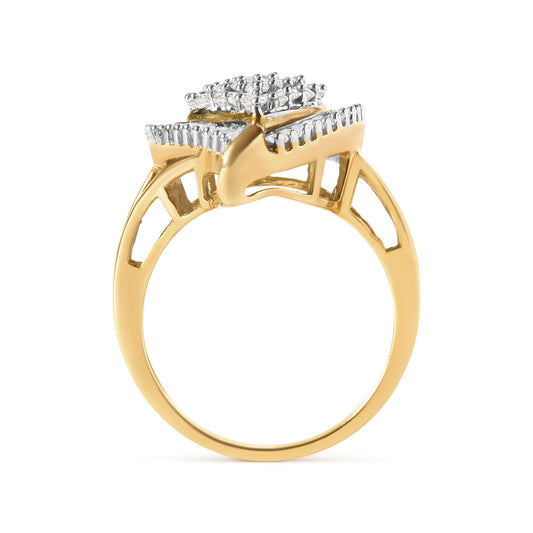 Side view of yellow ring with round and baguette white gemstones in prong settings clustered on top.
