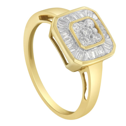 Yellow metal ring with square-shaped top viewed at slight angle, featuring a cluster of round white gemstones in prong settings surrounded by a border of baguette white gemstones in channel settings.