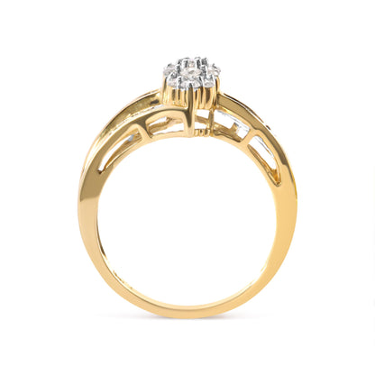 Yellow metal ring with round white gemstones in prong settings and baguette white gemstones in channel setting, side view.