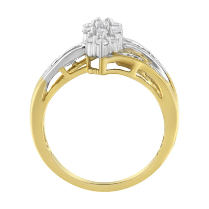 Front angled view of a two-tone ring with yellow and white metal featuring round white gemstones in prong settings and baguette white gemstones in channel settings.