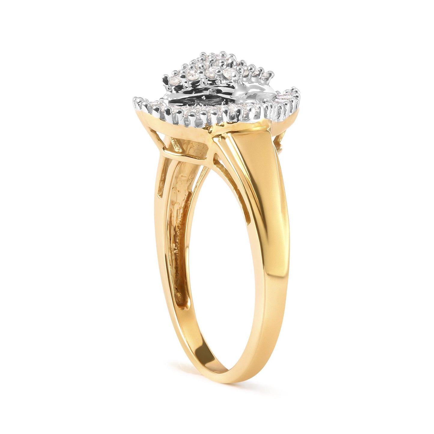 Side view of a yellow metal ring with white round gemstones set in prongs and white baguette gemstones set in channels on top.