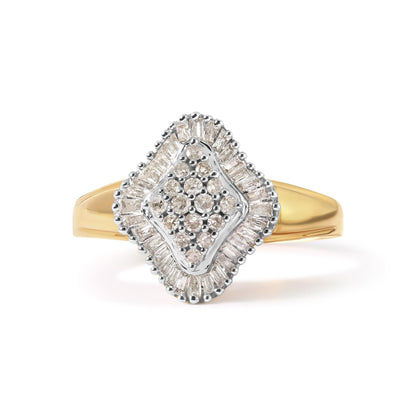 Front angle view of a yellow metal ring featuring a diamond-shaped cluster of round white gemstones in prong settings, surrounded by a halo of baguette white gemstones in channel settings.