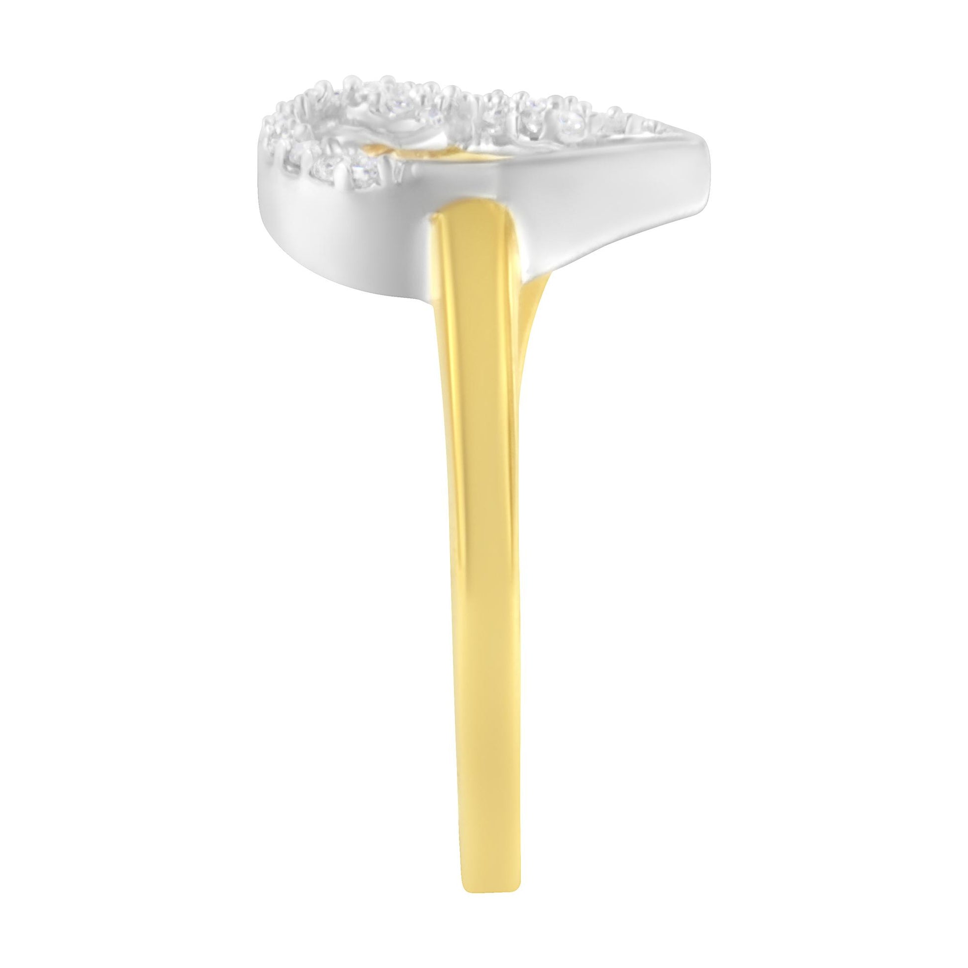 Side angle view of a ring with a yellow band and white top featuring multiple round white gemstones in a prong setting.