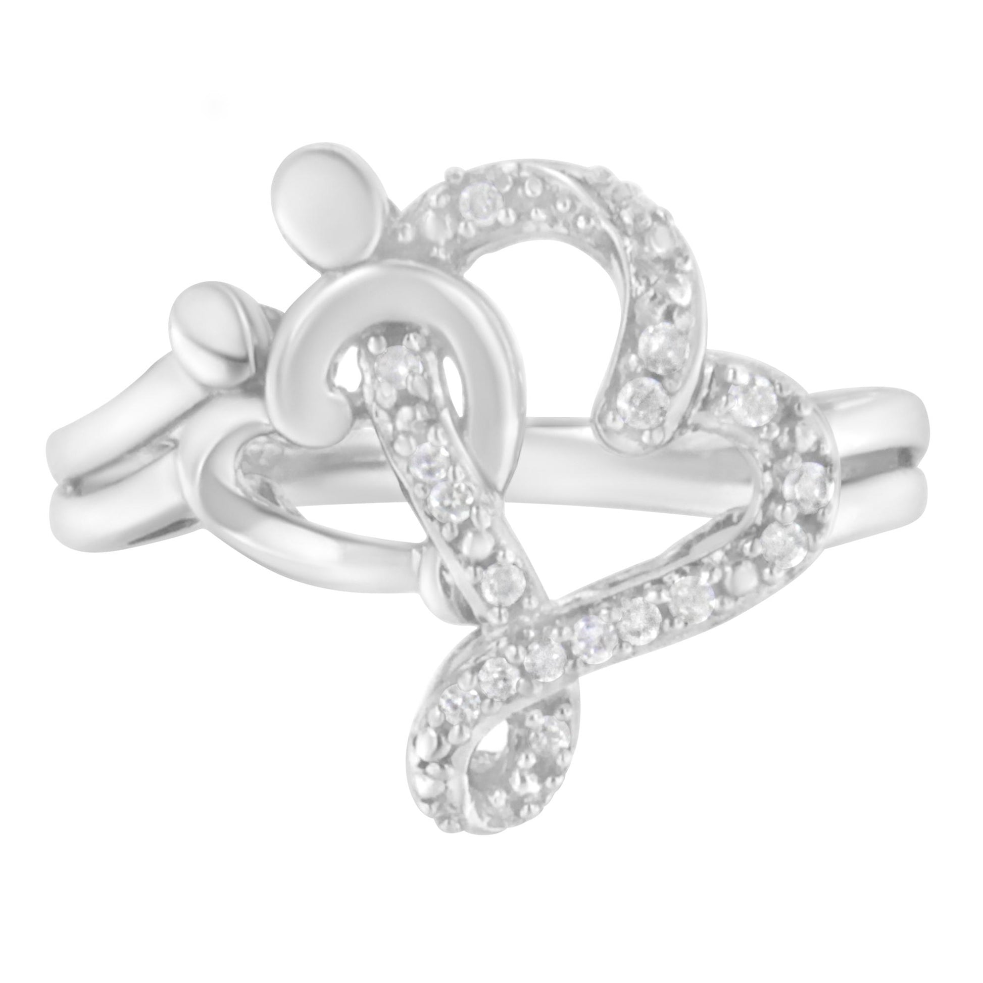 Close-up front angle of a white metal ring featuring a heart shape and abstract designs adorned with small round white gemstones in a pave setting.