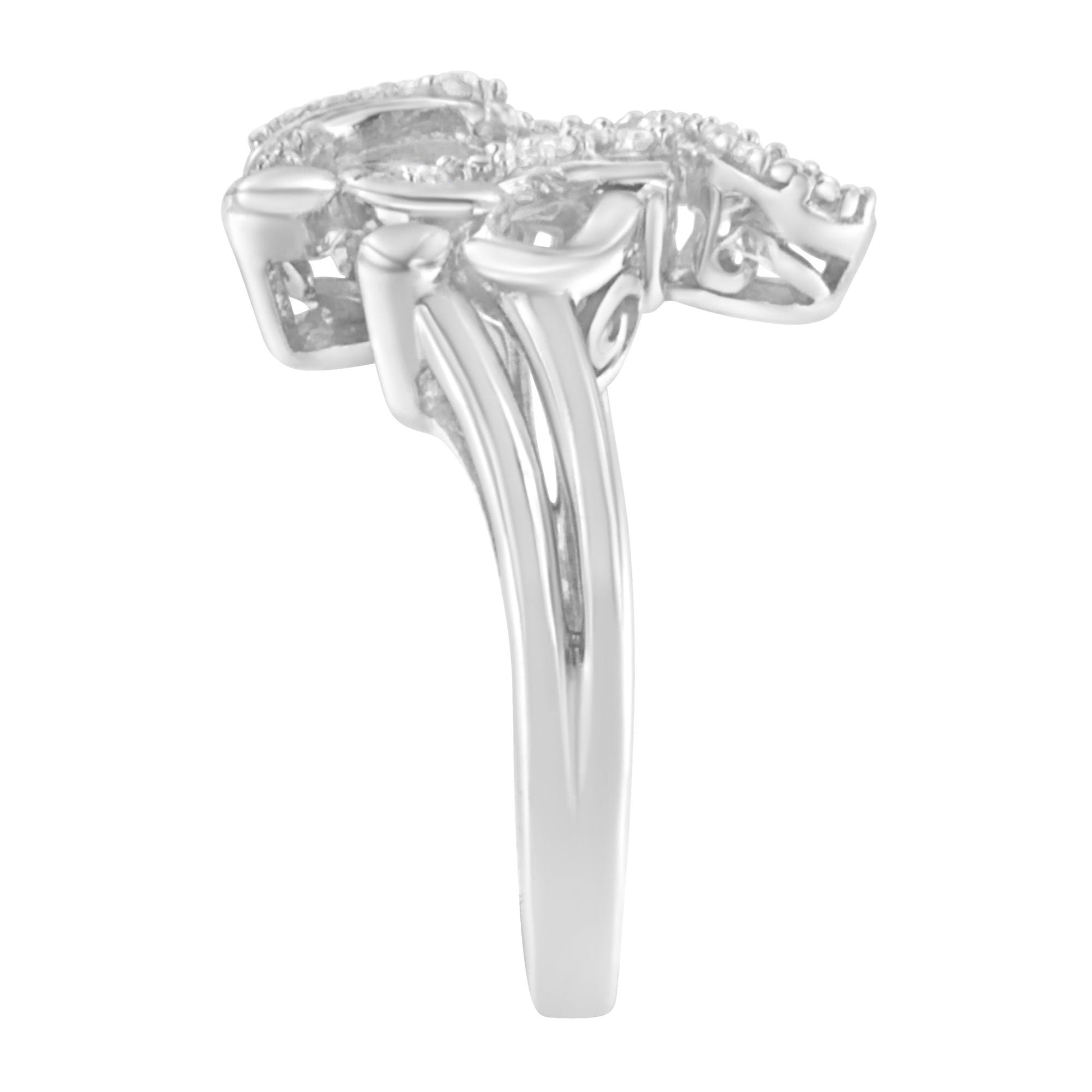 Side view of a white-colored metal ring featuring multiple round-shaped white gemstones in a pave setting.