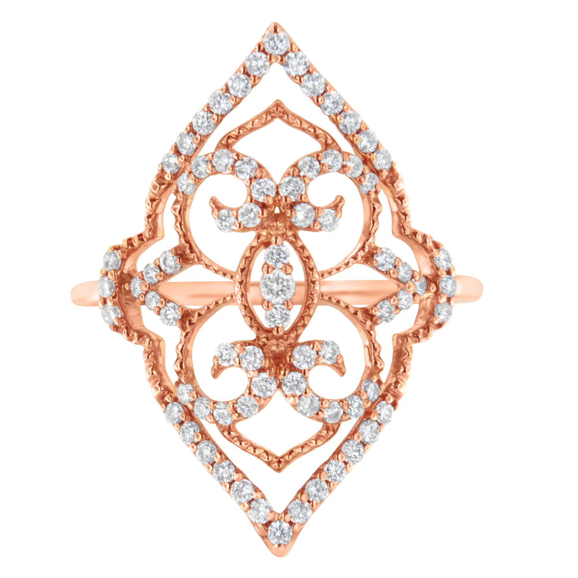 Top-down view of a rose colored metal ring with an openwork design adorned with multiple white round prong-set gemstones.