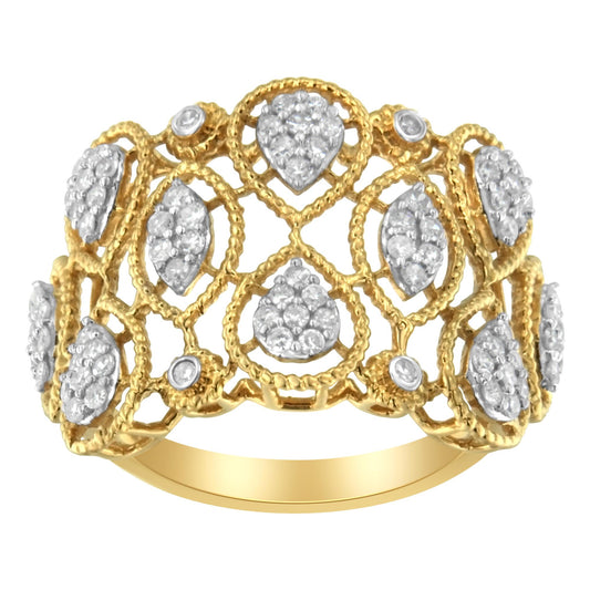 Front close-up of yellow metal ring with openwork design featuring multiple pear-shaped clusters of white gemstones in pave setting.