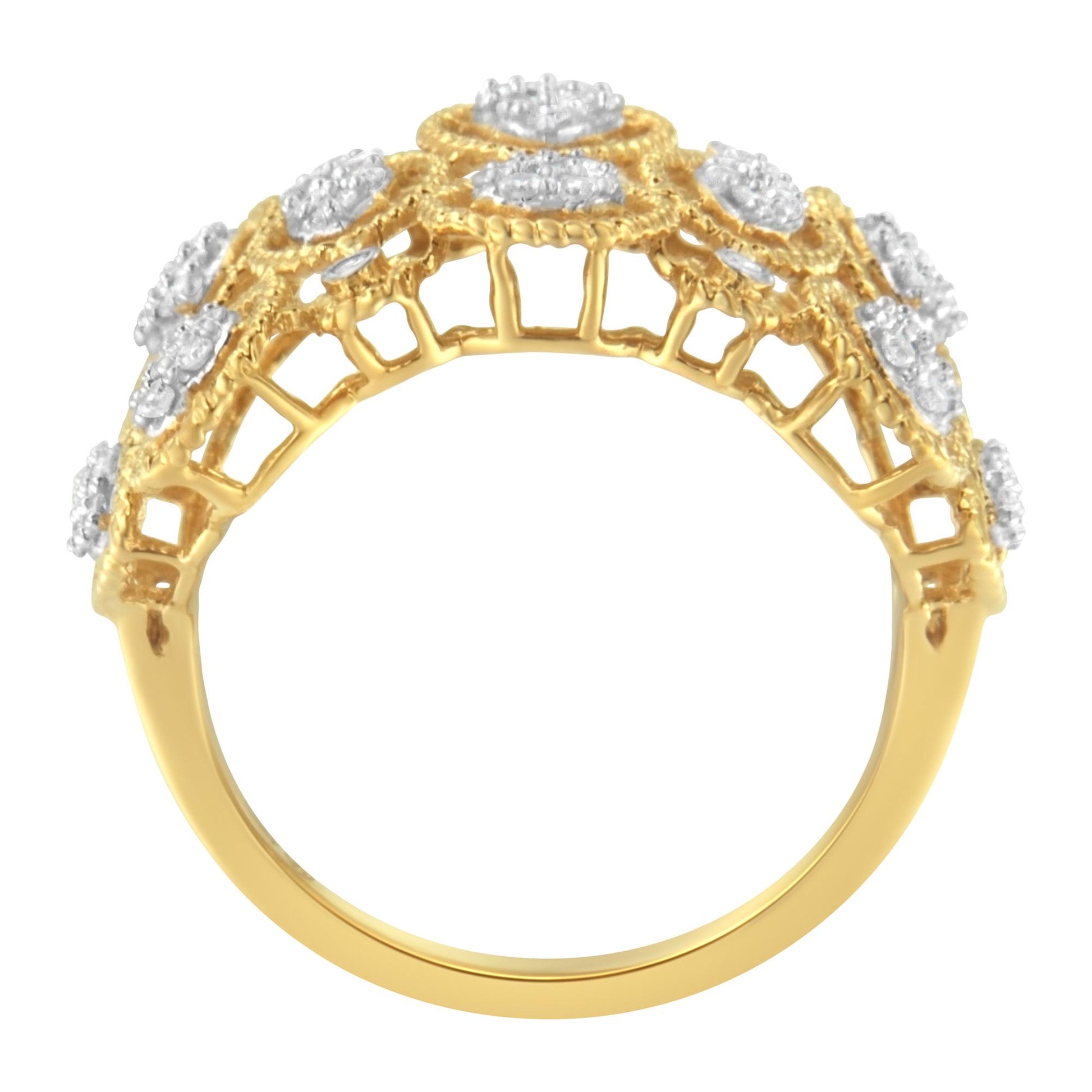 Side view of a yellow ring with round white gemstones in pave setting arranged in floral patterns.