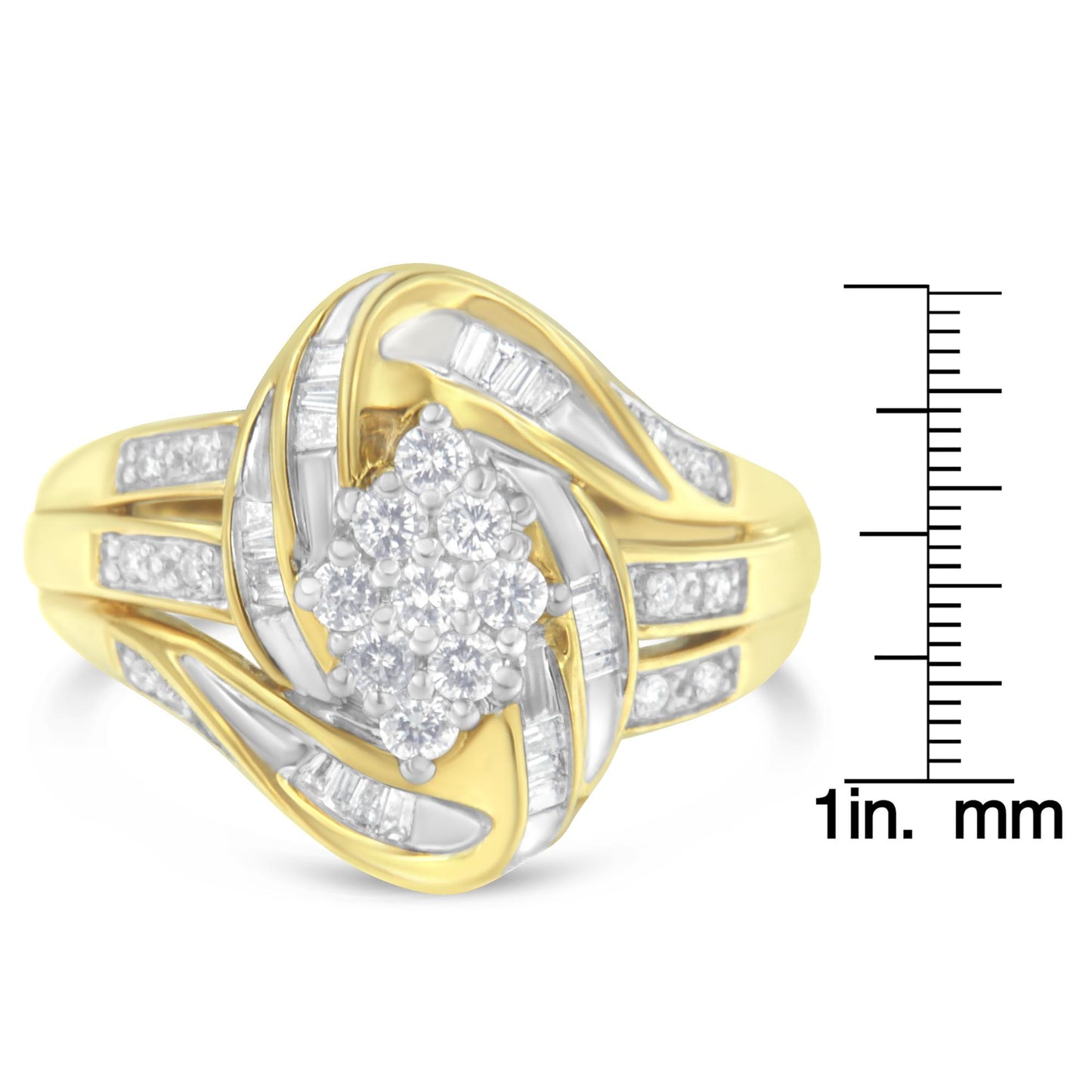 Front angle view of a yellow ring with clustered round white gemstones in prong settings at the center, surrounded by baguette white gemstones in channel settings along sweeping curves, shown on a ruler for size reference.