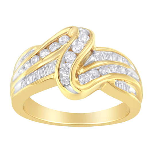 Yellow metal ring with an intertwined design featuring channel-set white round and baguette gemstones, shown from a front angle.
