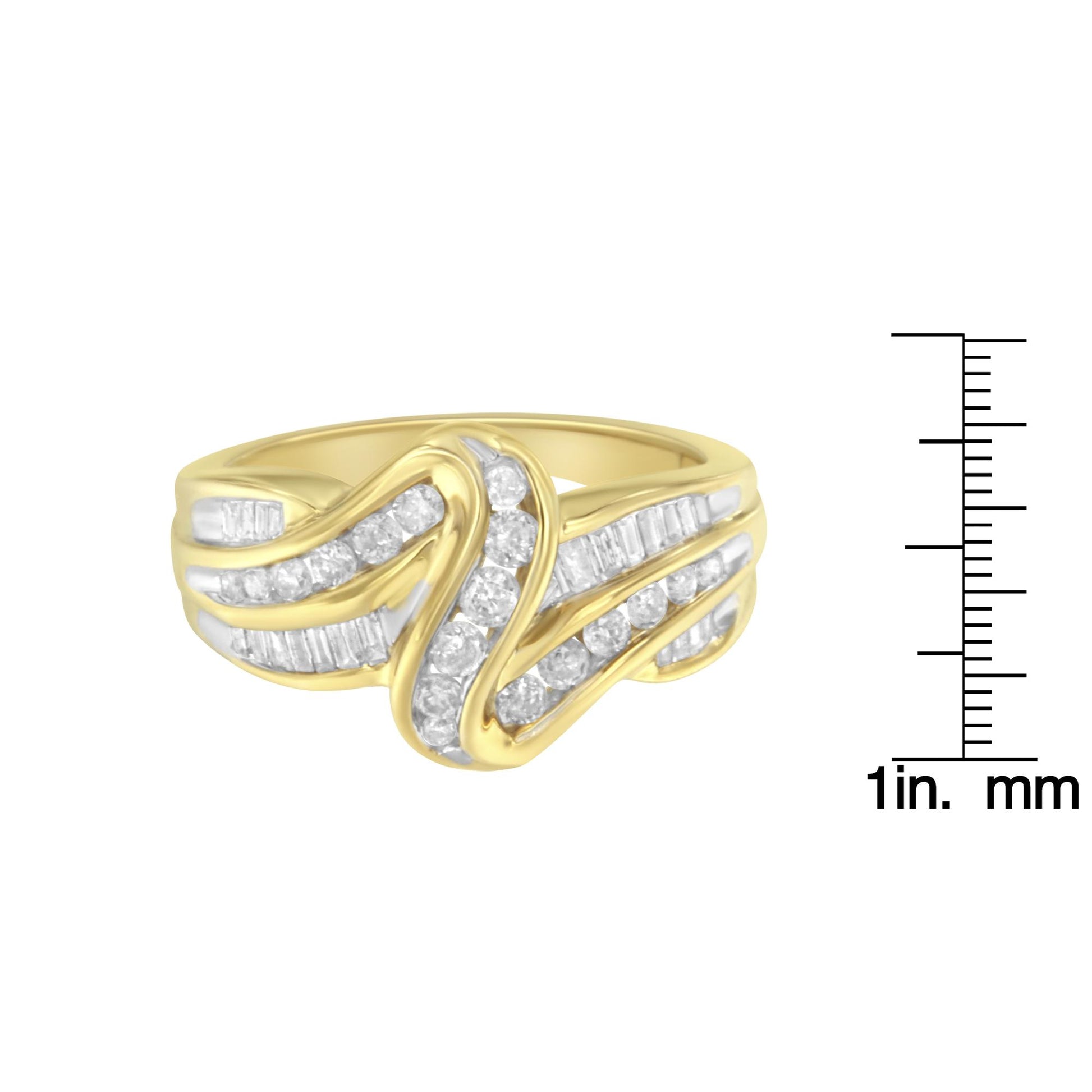 Yellow metal ring with flowing bands of channel-set white round and baguette gemstones, shown in a front-facing view next to a size reference ruler.