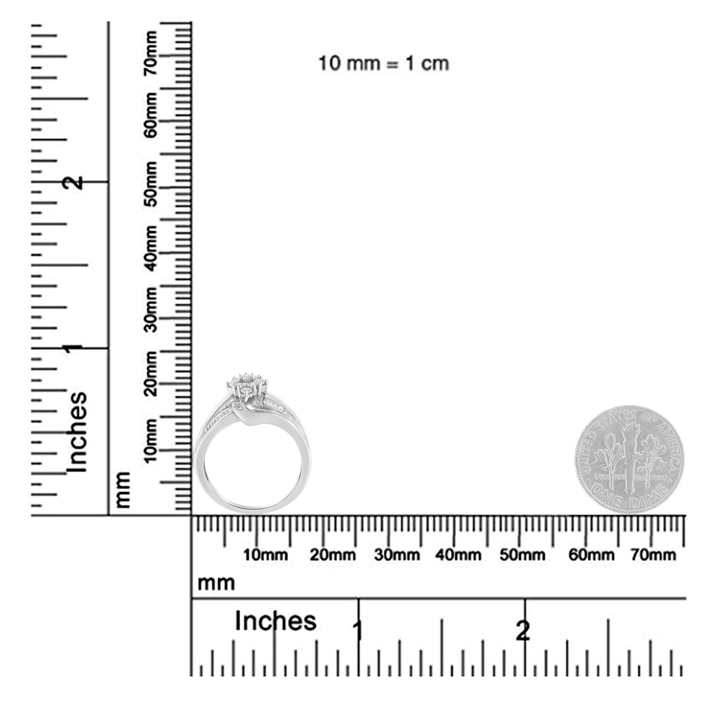 White metal ring with round and baguette white gemstones in prong and channel settings, shown from a side angle on a ruler and scale for size reference.