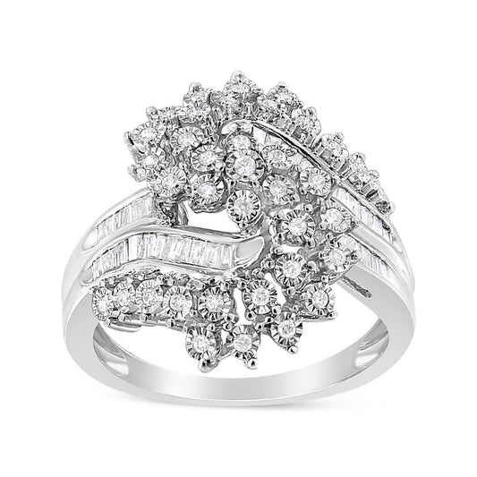 Front angle view of a white metal ring featuring an elaborate cluster of round white gemstones in miracle and prong settings.