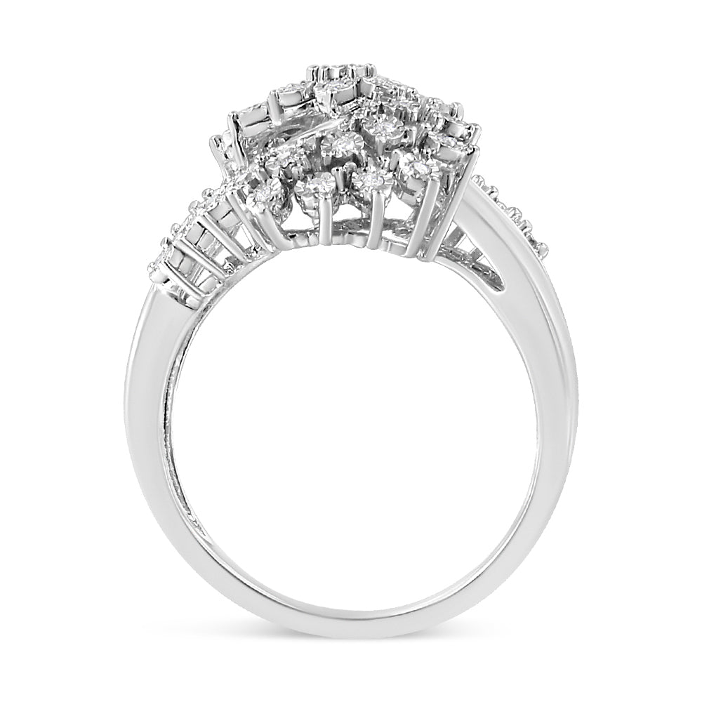 Side view of a white metal ring with three round white gemstones in a cluster miracle setting and additional round white gemstones in prong settings along the band.