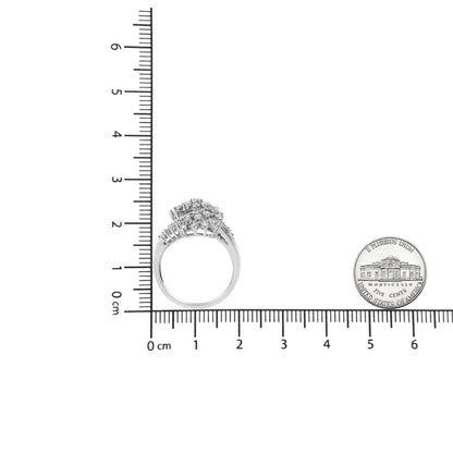White metal ring with multiple round and baguette-shaped white gemstones in miracle and channel settings, placed upright next to rulers and a coin for size reference, shown from a side angle.