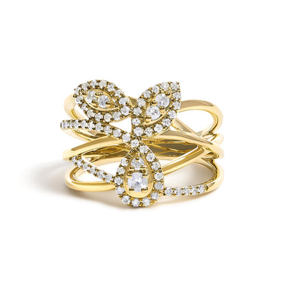 Front close-up of a yellow metal ring featuring an intricate design with multiple intersecting bands adorned with prong-set white round gemstones outlining teardrop and marquise shapes.