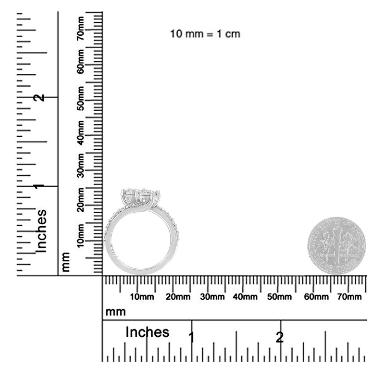White metal ring with two round white gemstones in miracle setting and multiple smaller round white gemstones in prong setting along the band, shown in side profile on a ruler and scale for size reference.