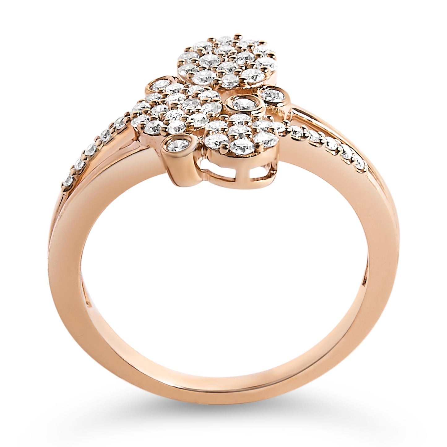 Close-up front angle of a rose-colored ring with multiple clusters of round white gemstones in prong settings on the top and along the band.
