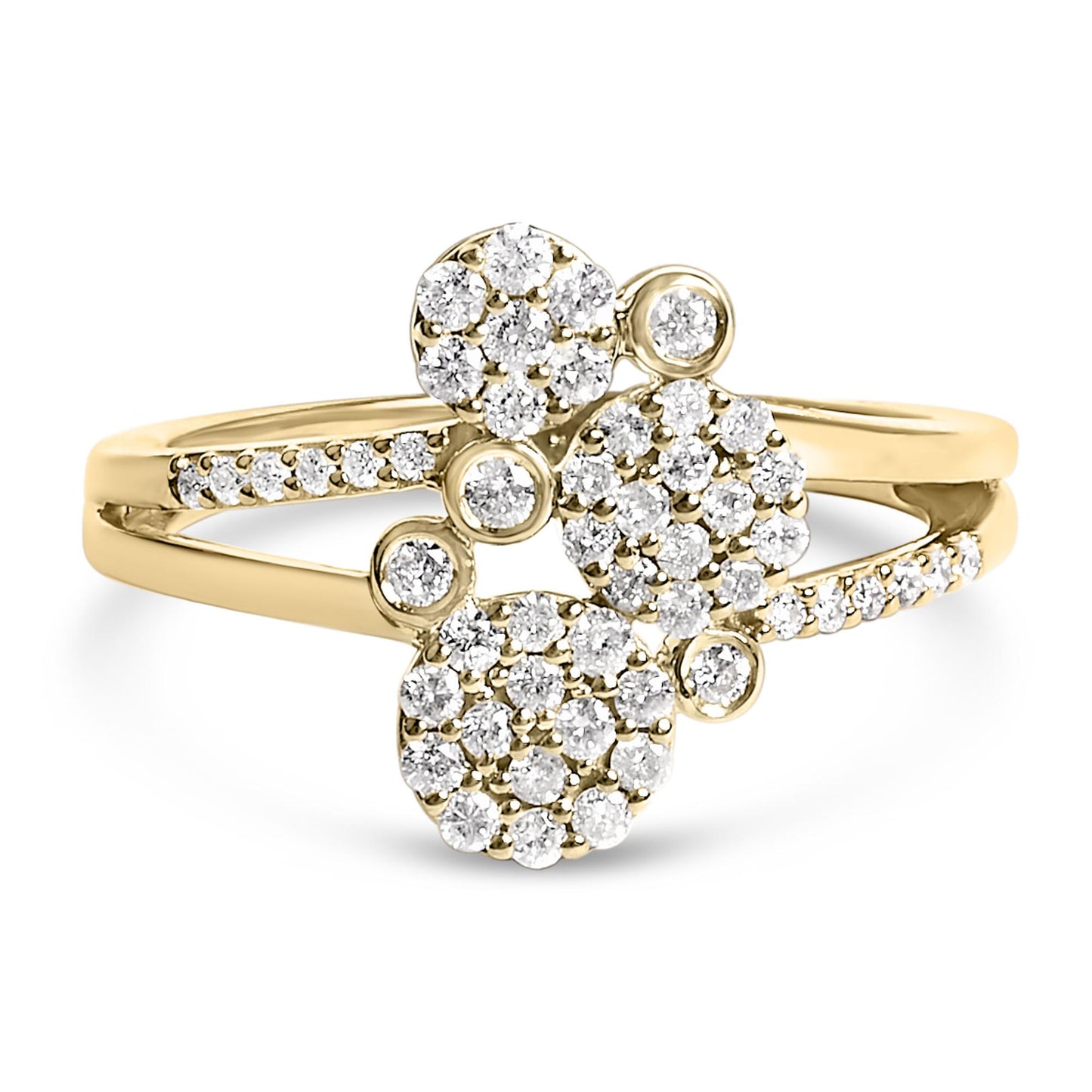 Close-up front angle of a yellow ring featuring multiple clusters of round white gemstones in prong settings along the band and top.