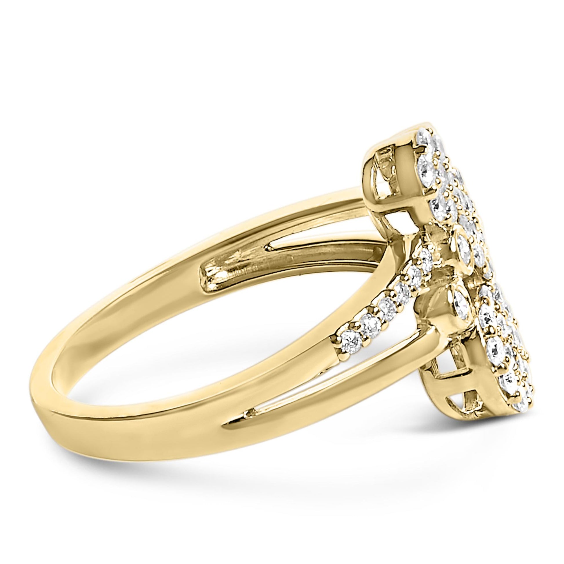 Side angle of a yellow metal ring featuring multiple small white gemstones in prong settings arranged on the upper band and cluster top.