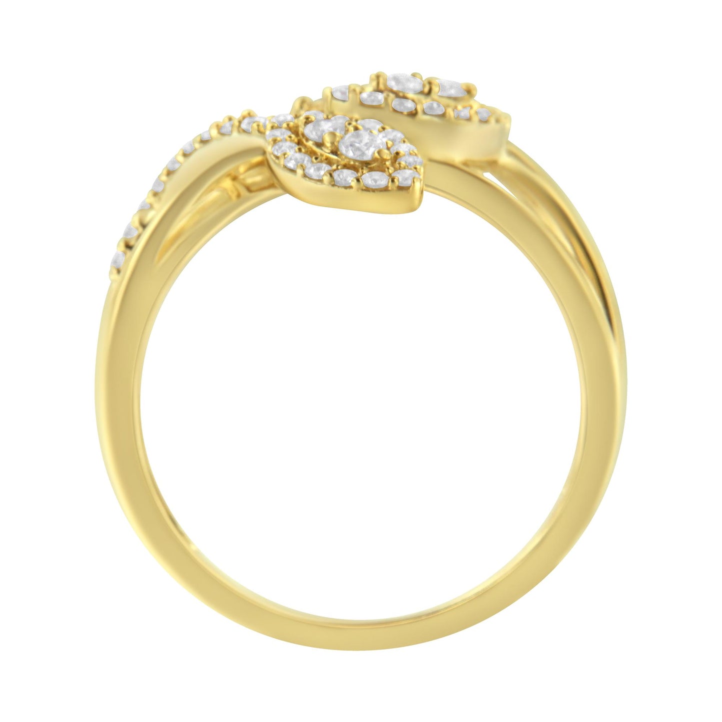 Yellow metal ring with round white gemstones in prong settings, shown from a side angle.