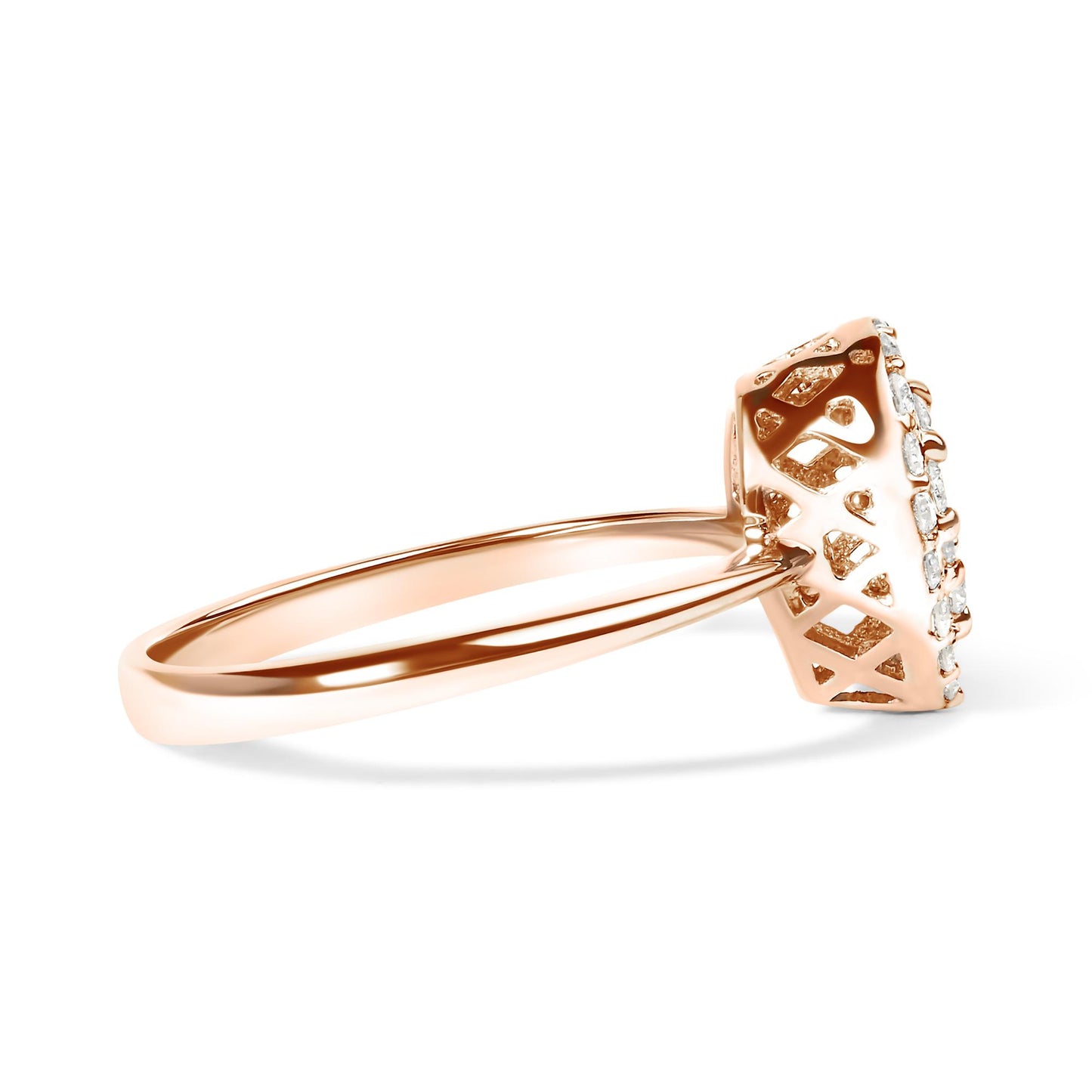 Side angle view of a rose-colored ring with a raised setting featuring multiple round white gemstones in prong settings.